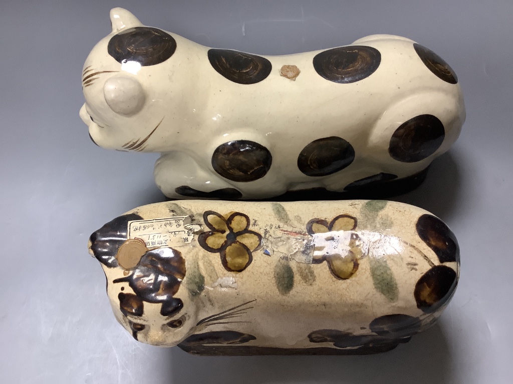 A 19th century Chinese Cizhou style 'cat' pillow and another later example, length 34cm